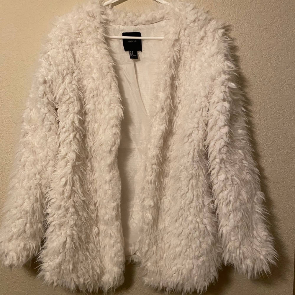 White faux fur coat